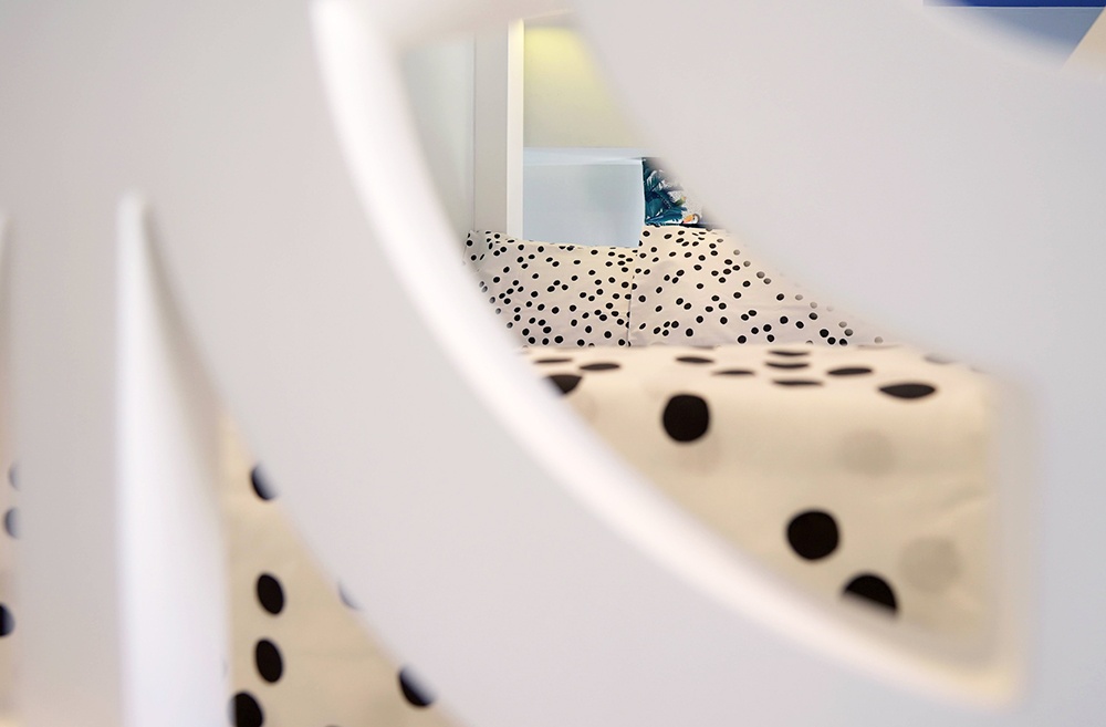 bunk bed circular detial and monochrome polka dot bedding