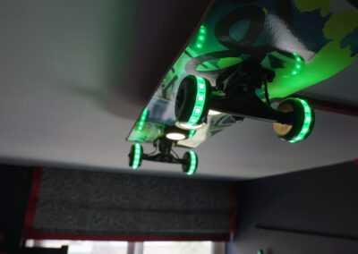 skateboard light, lit up in green