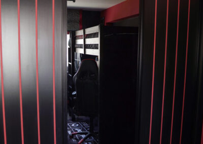 black wardrobe with red stripes and smoked mirror