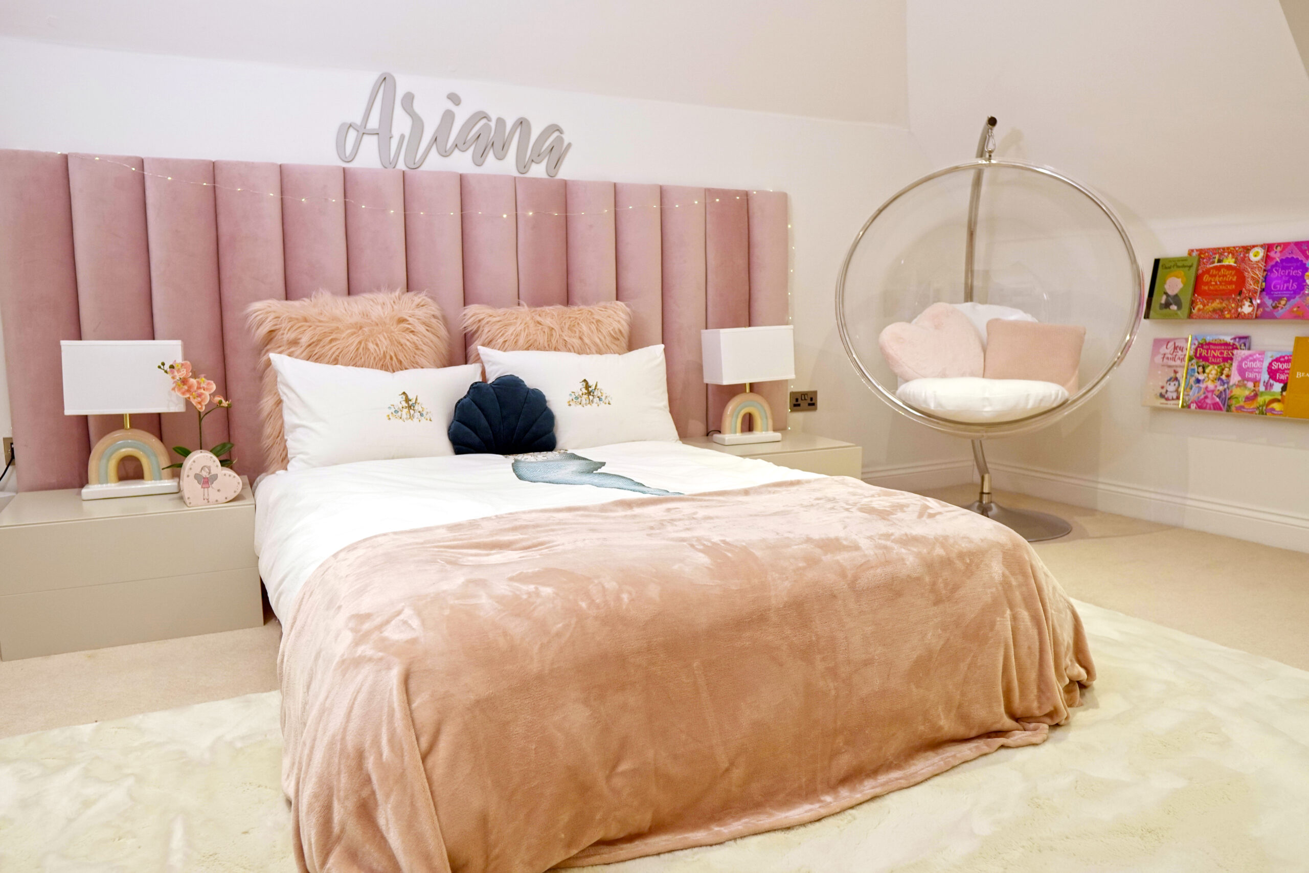 MK Kids INteriors- luxury girls upholstered headboard in soft pink- bubble chair and reading corner