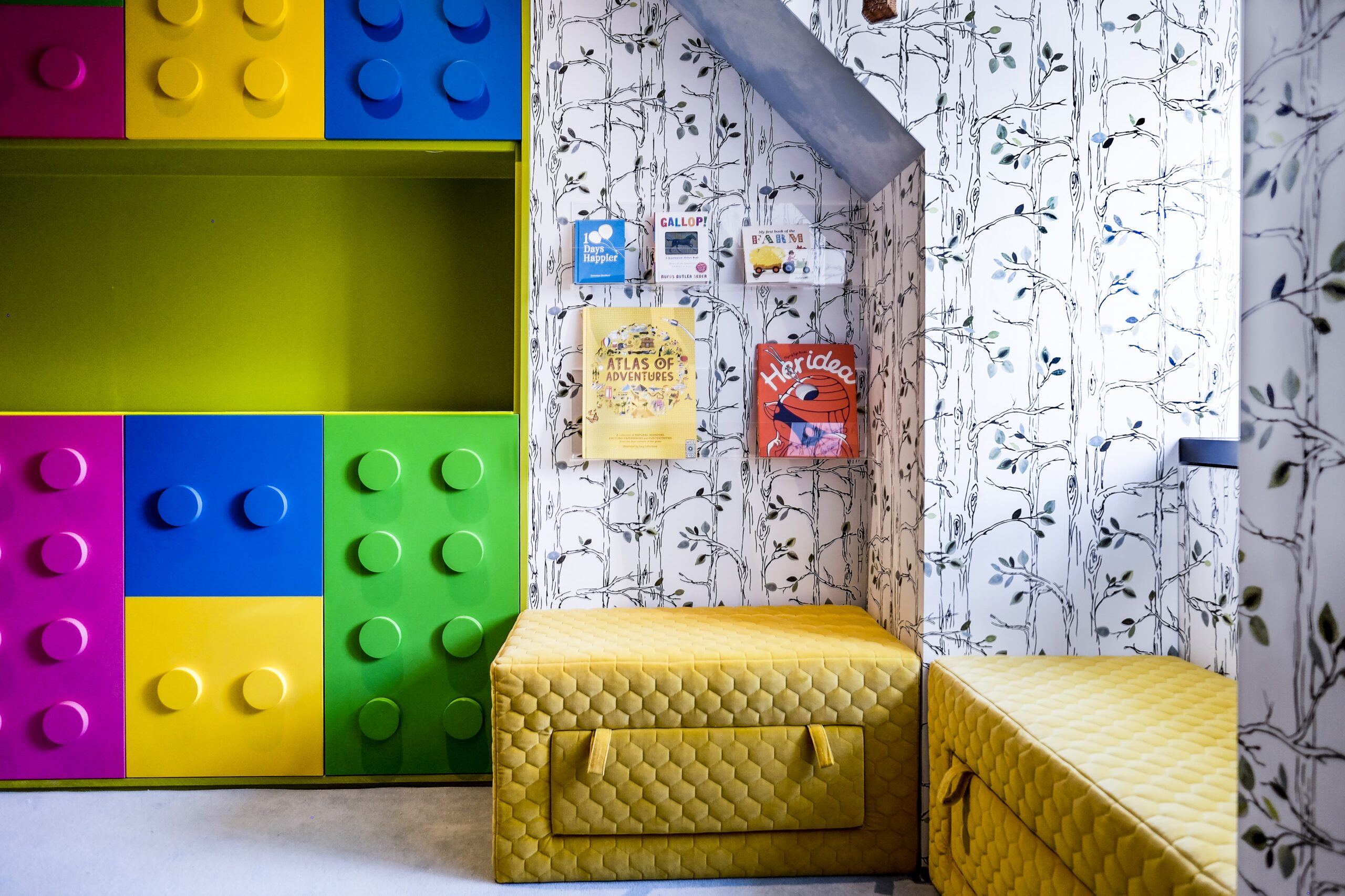 MK Kids Interiors mezzanine playhouse with slide playroom design
